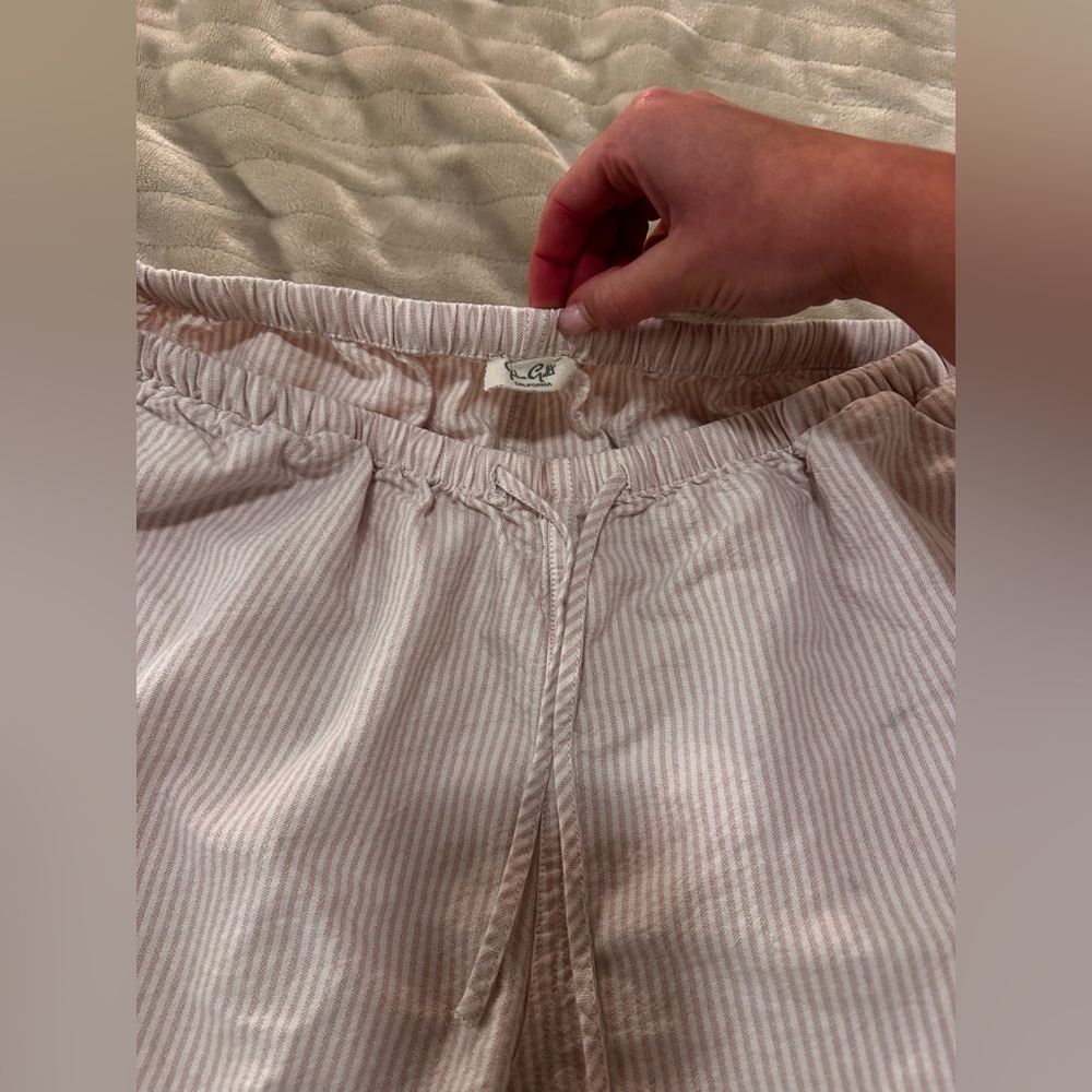 John Gault, pink and white striped lounge pants